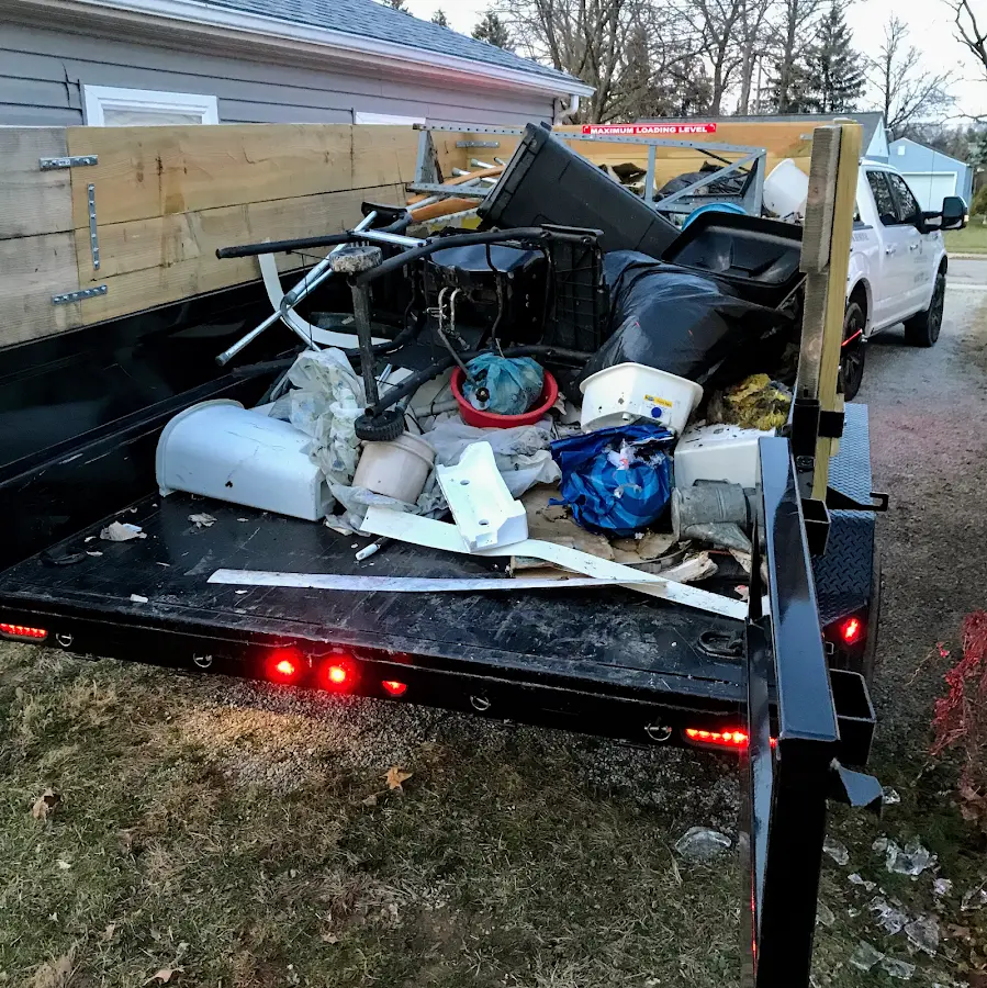 Roll-off dumpster delivered to a residential driveway in Prien